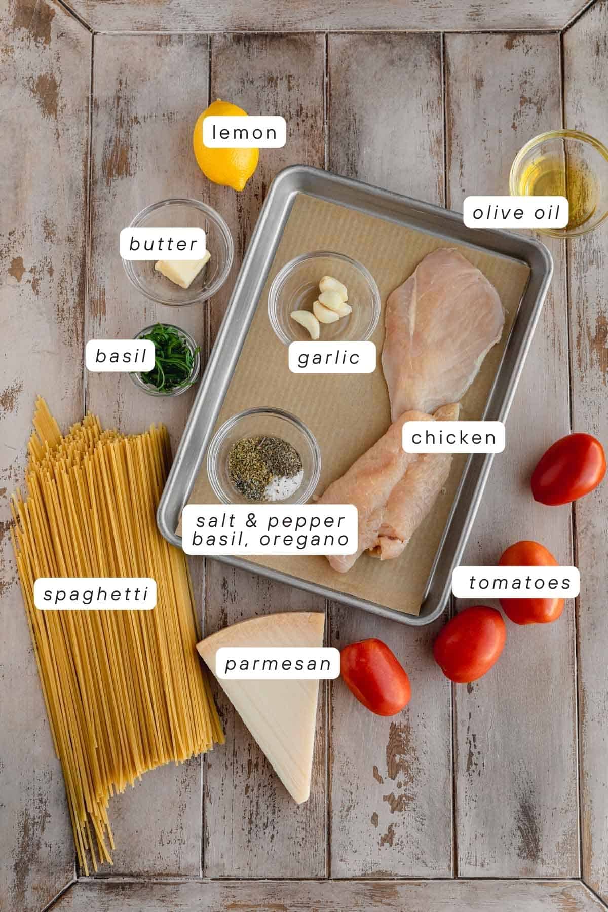 Spaghetti, garlic, parmesan, tomatoes, lemon, basil, salt, pepper, chicken, oregano, olive oil.