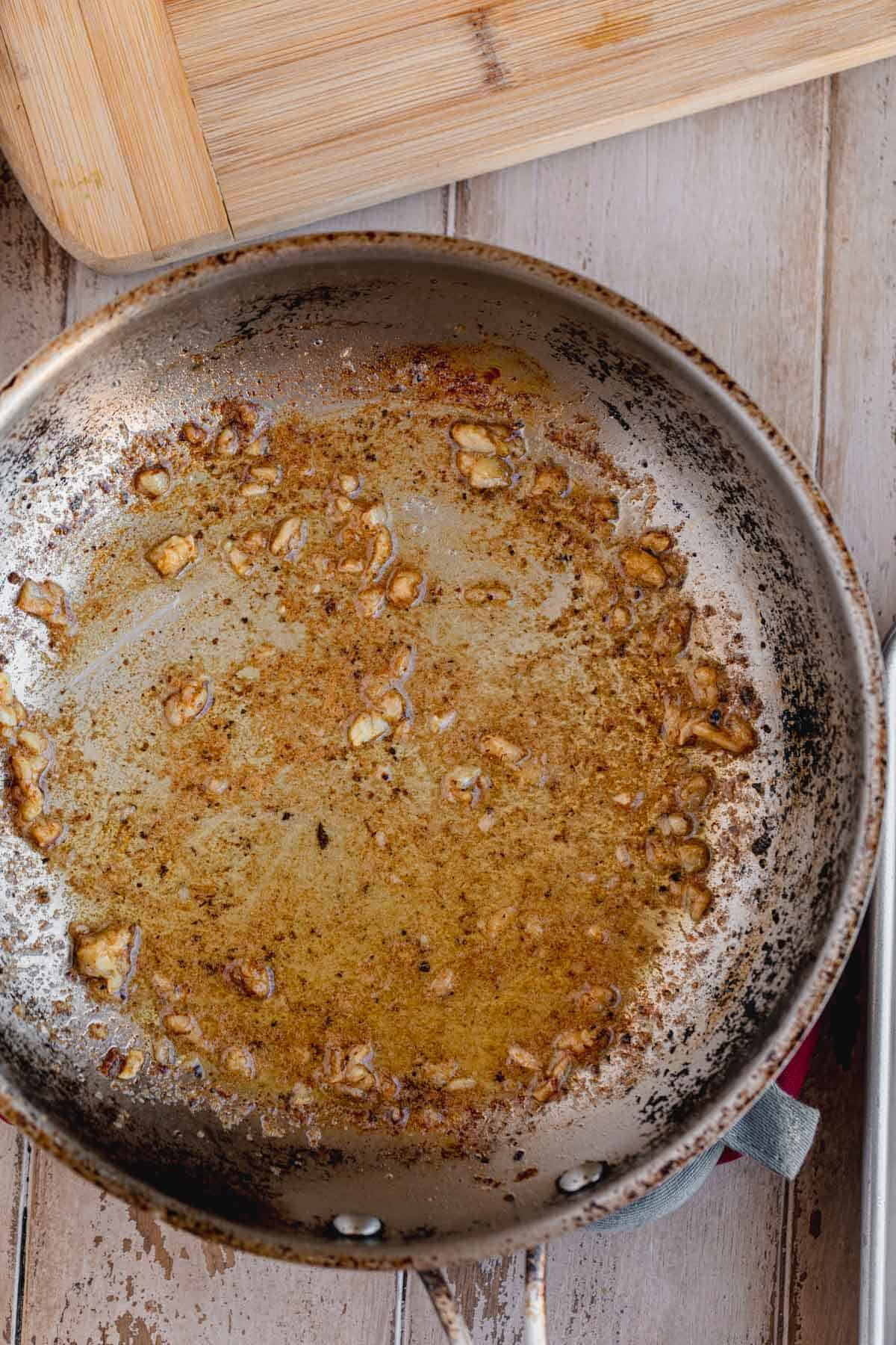 Melted garlic butter in a pan. 
