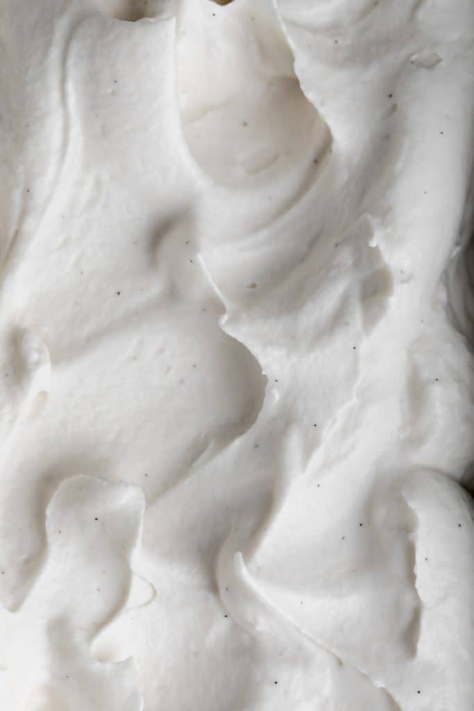 close up of the whipped cream and honey vanilla mixture before it is frozen