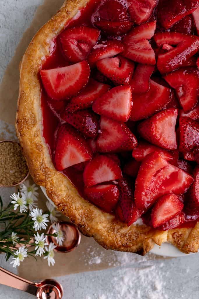 strawberry mixture poured into the pie crust over the top of the cream cheese mixture