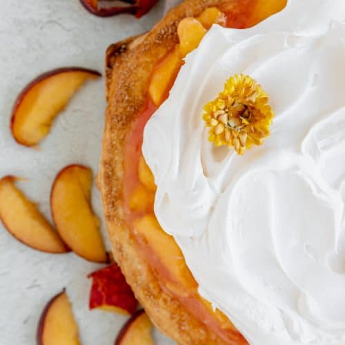 peaches and cream pie topped with cool whip