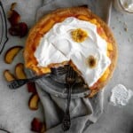 Peaches and Cream Pie with whipped cream on top.