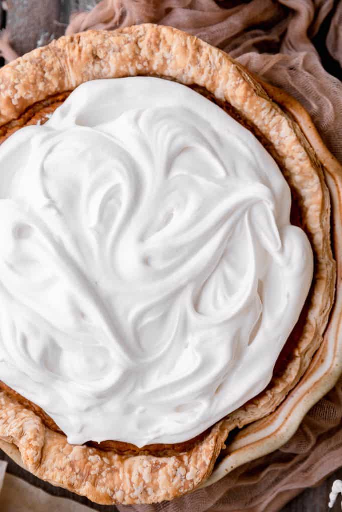 southern sweet potato pie topped with meringue before it's toasted