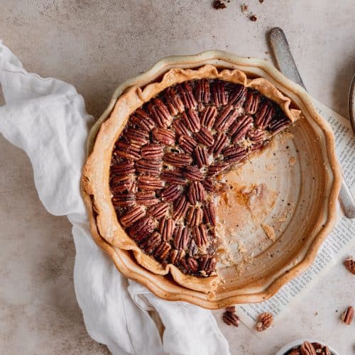 pecan pie with a couple slices cut out