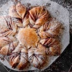 Raspberry Star Bread dusted with powdered sugar.