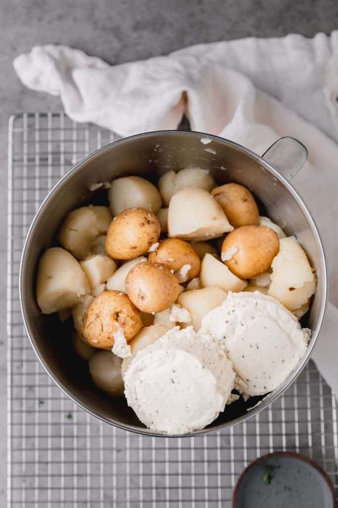 Yukon potatoes and russet potatoes in a stand mixer