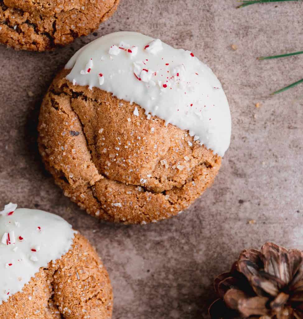 soft molasses cookie with white chocolate and crushed candy cane