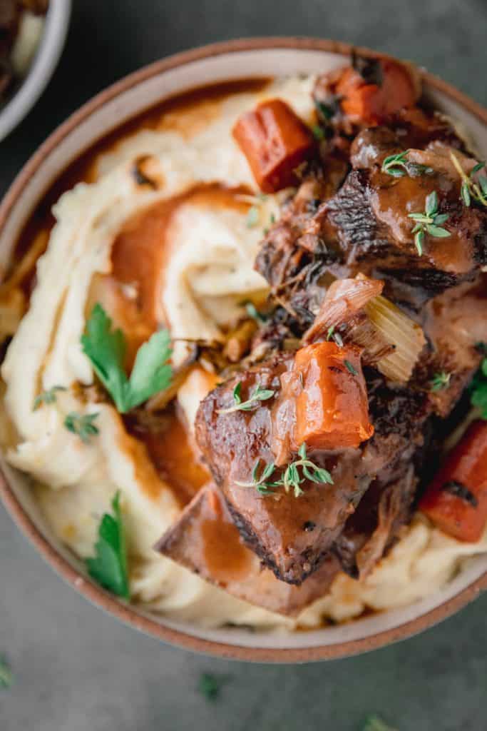 red wine braised beef short ribs over mashed potatoes