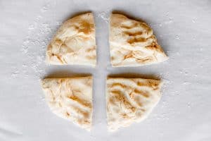 dough cut into 4 equal parts