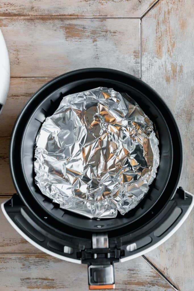 aluminum foil inside the basket of an air fryer