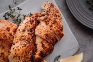 juicy air fryer chicken breast sliced and whole