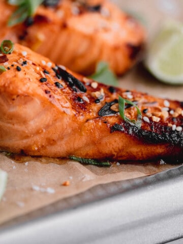 Asian Air Fryer Salmon with sesame seeds and cilantro.
