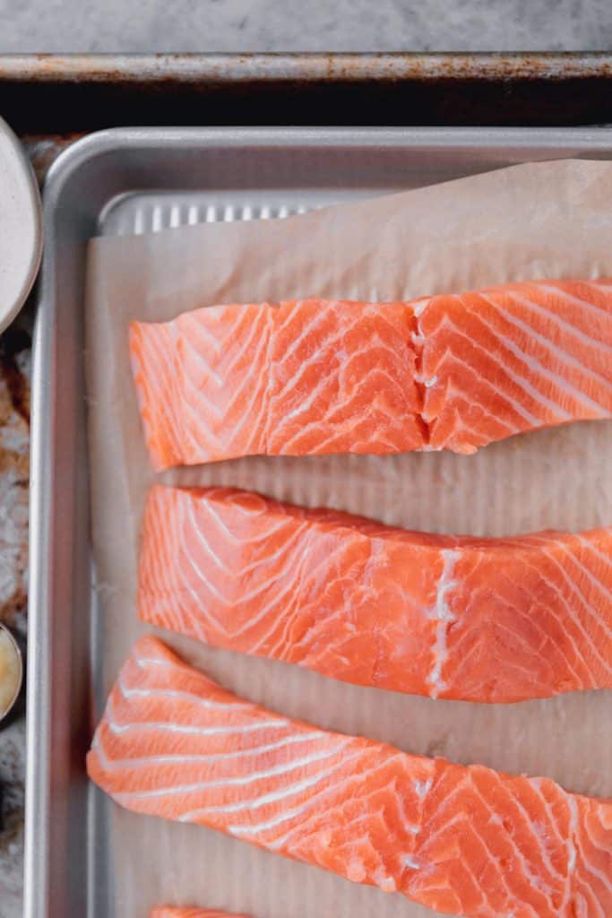 salmon filets on a tray