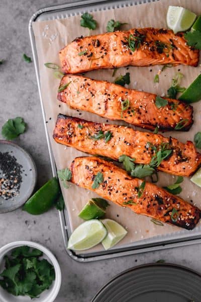 Asian air fryer salmon with lime wedges