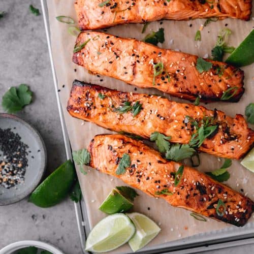 Asian air fryer salmon with lime wedges