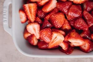 prepared strawberries in a baking dish