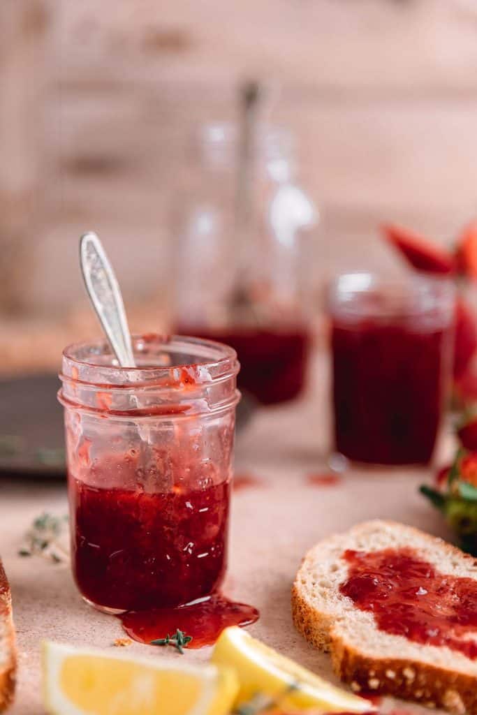 strawberry jam with lemon wedges