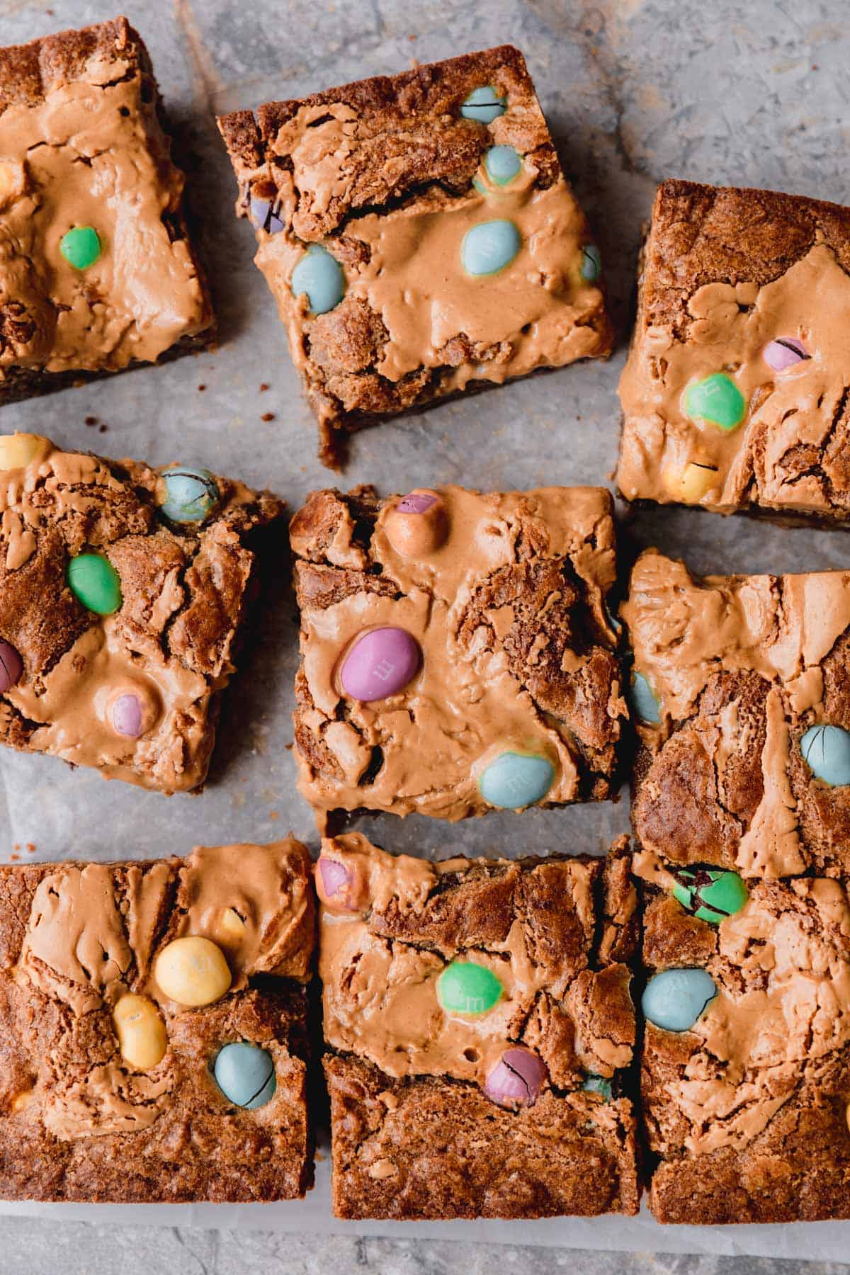 Easter Peanut Butter Blondies with Easter colored pastel M&M's cut into squares. 
