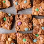 Easter Peanut Butter Blondies with pastel colored M&M's cut into squares.