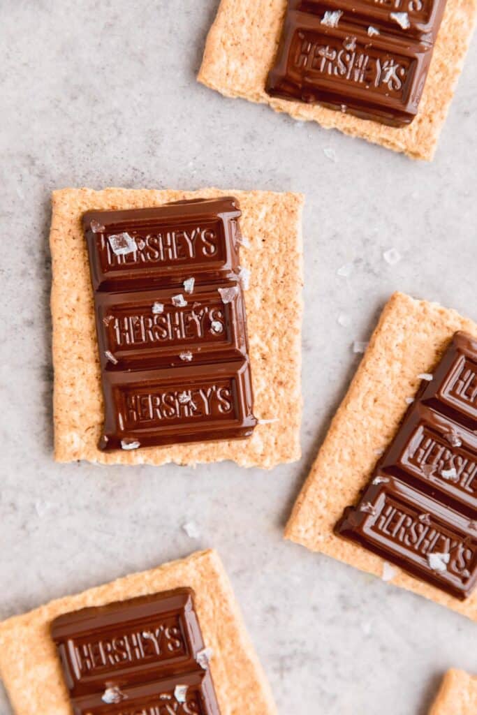 graham crackers topped with melty chocolate and flaky sea salt