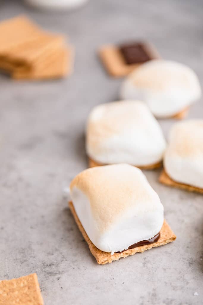 air fried marshmallows on top of graham crackers and chocolate