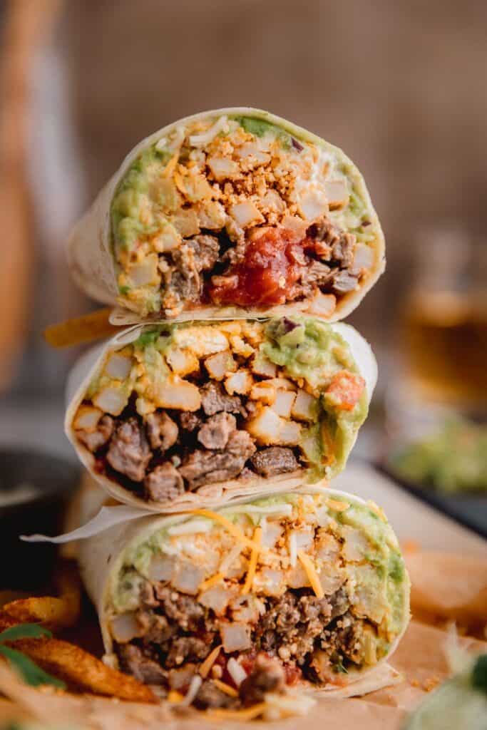 California burritos stacked on top of each other