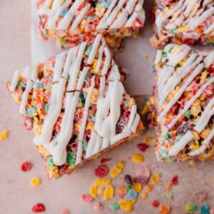 Fruity Pebbles Bars topped with white almond bark.