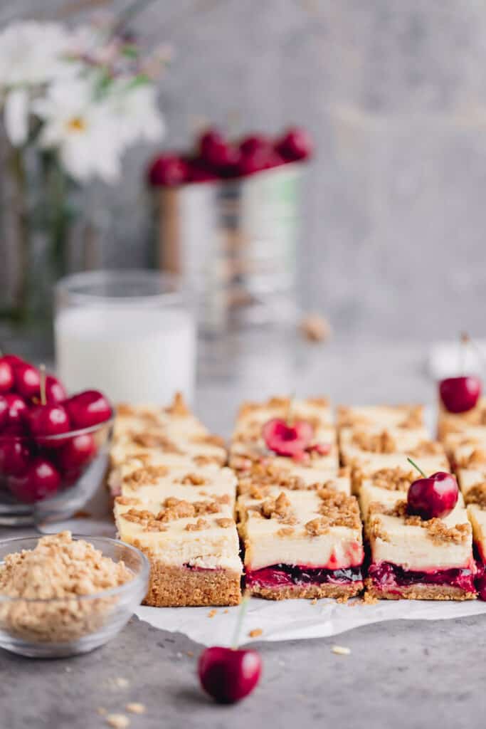 cut bars with fresh cherries on top 