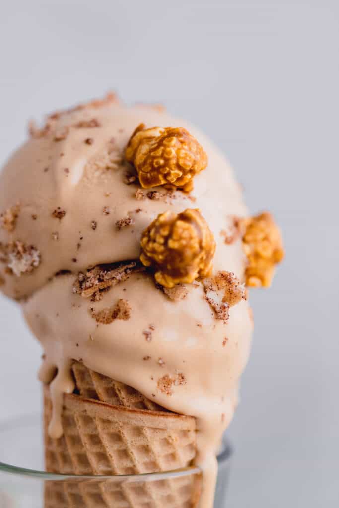 close up of the ice cream with caramel popcorn on it