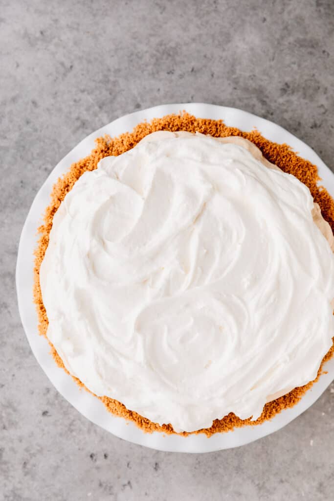 easy Reese's peanut butter cups pie recipe topped with cool whip