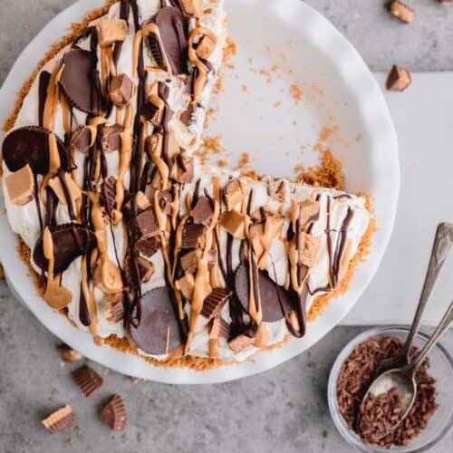 easy Reese's peanut butter cups pie recipe with a few slices cut out