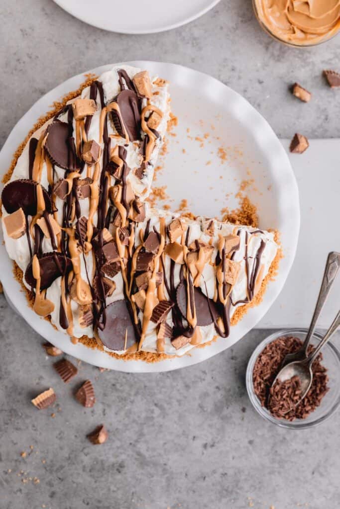 easy Reese's peanut butter cups pie recipe with a few slices cut out