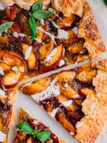 Spicy Peach Galette with basil sugar and goat cheese drizzle.