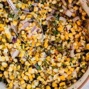 Roasted Chili Corn Salsa in a bowl with spoon.