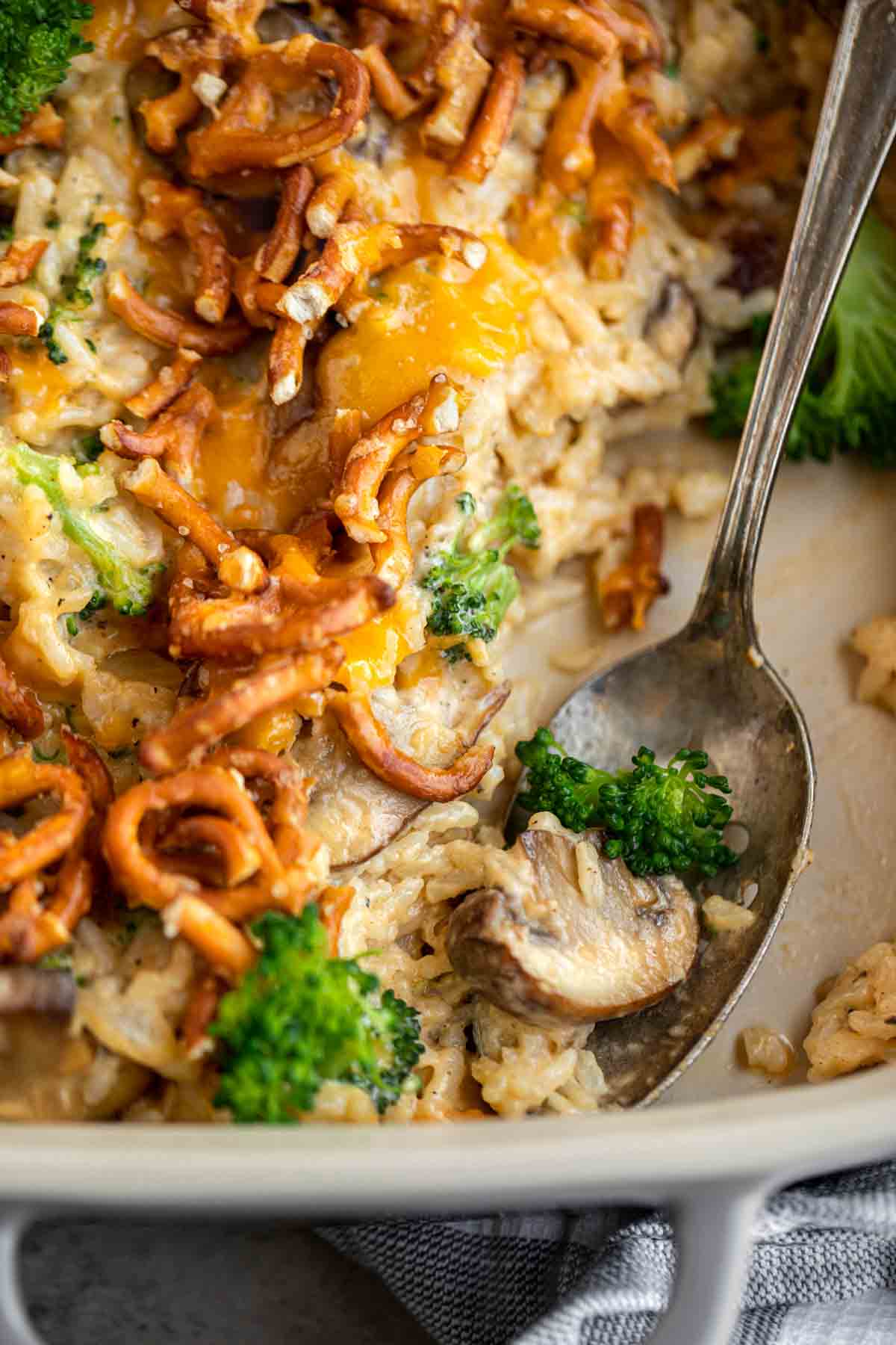 Broccoli Rice Casserole with Cheese and pretzel topping. 