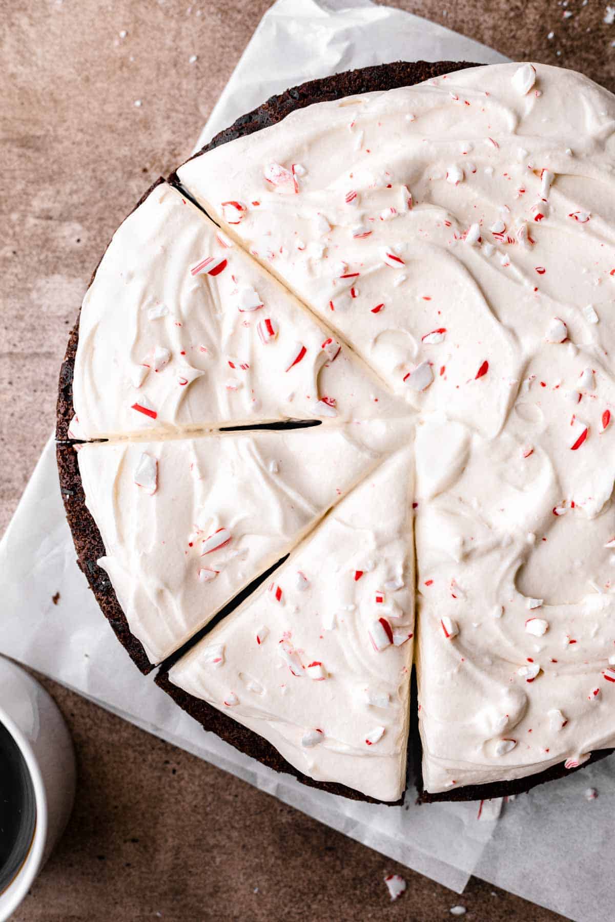 Chocolate Peppermint Cake with cream cheese frosting and crushed candy canes on top. 