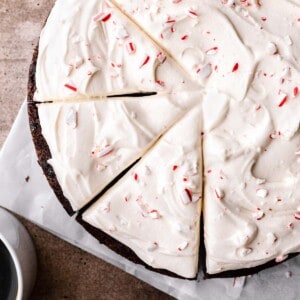Peppermint Chocolate Cake with cream cheese frosting and crushed candy cane on top.