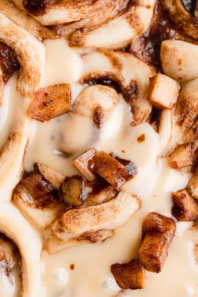 Cinnamon rolls with apple pie filling and vanilla butter sauce.