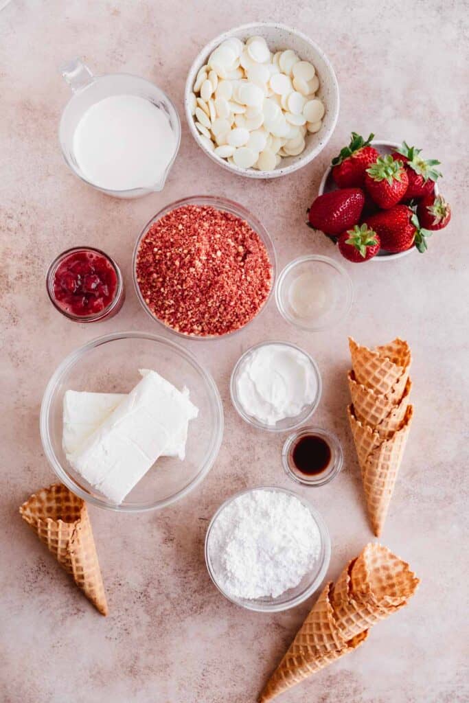 Strawberry crunch topping, strawberry compote, waffle cones, vanilla melting wafers, strawberries, cream cheese, powdered sugar, vanilla, lemon juice and heavy whipping cream.
