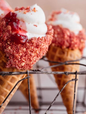 Strawberry Cheesecake Cone with crunchy cookie topping.