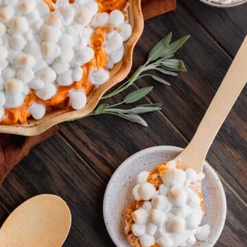 Whipped sweet potatoes topped with marshmallows and sage.