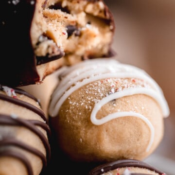 Cookie Dough Bites with white chocolate drizzle or dark chocolate drizzle, topped with flaky sea salt.