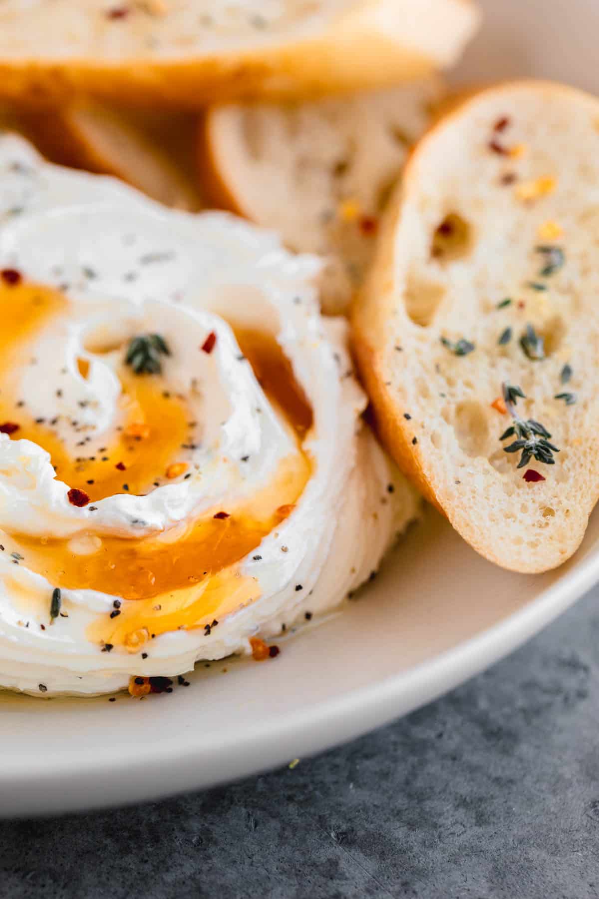 Whipped goat cheese with honey and garlic crostini.