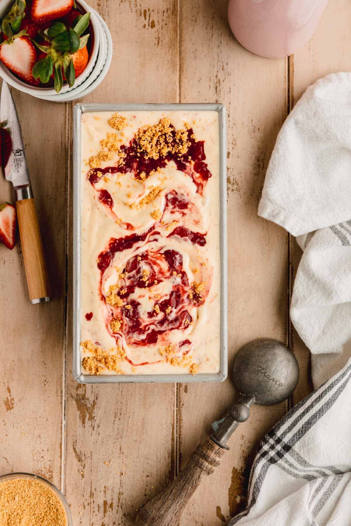 Strawberry Cheesecake Ice Cream in a loaf pan. 