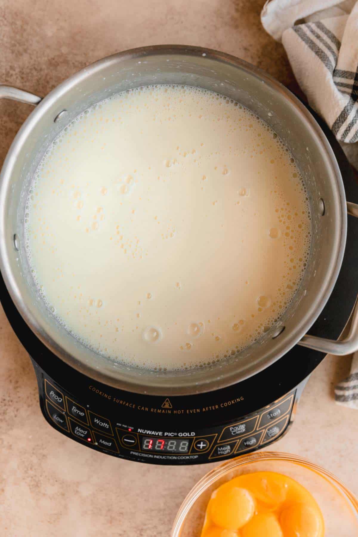 Heavy cream, milk, cream cheese and sugar in a pot. 