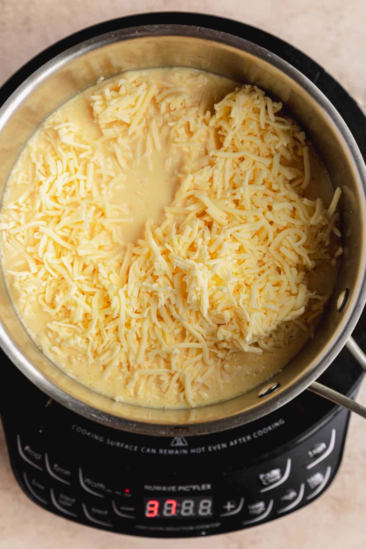 Cheese sauce ingredients in a pot. 