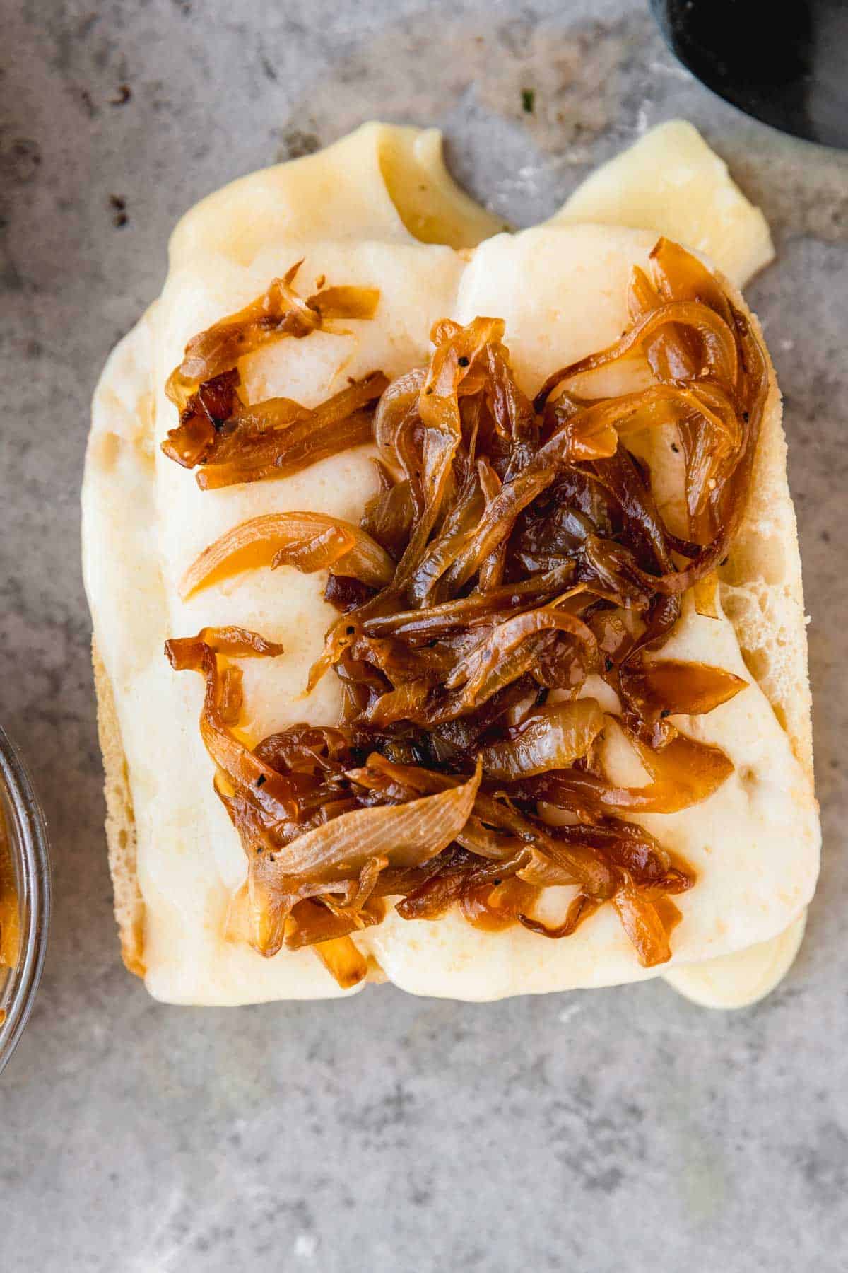 Havarti cheese and caramelized onions on ciabatta bread.