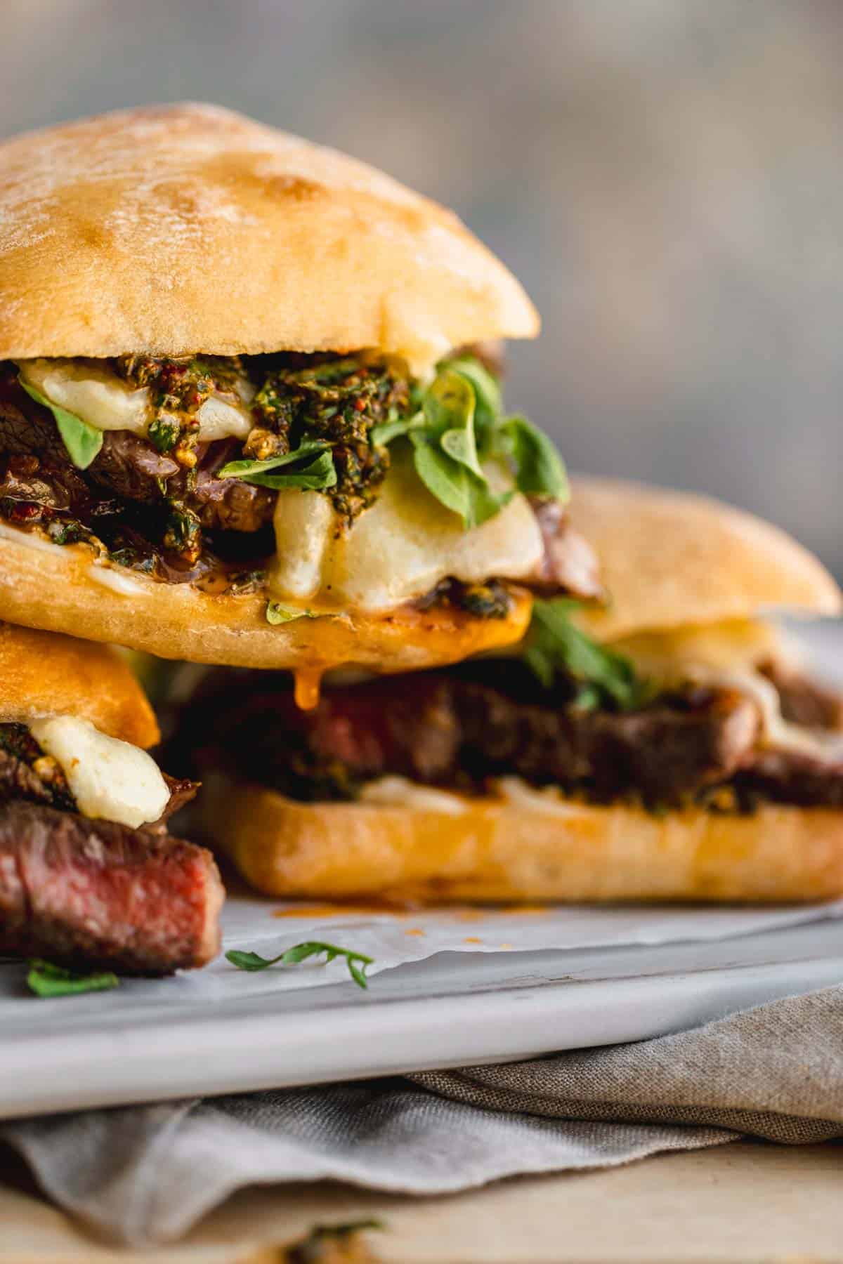 Ribeye Steak Sandwich with chimichurri, havarti cheese and arugula. 