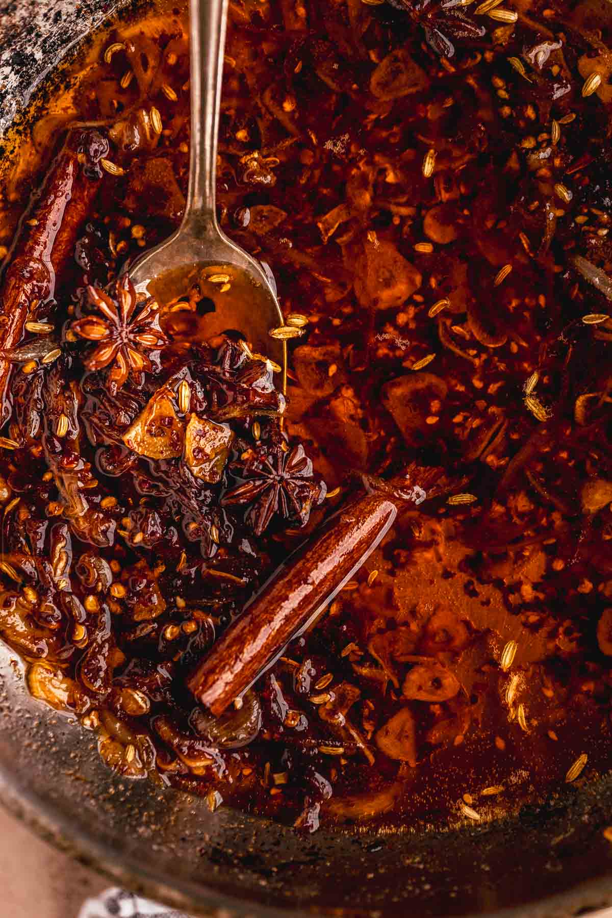 Garlic chili oil after remaining ingredients are added into the pan.