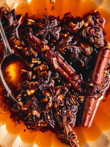 Garlic Chili Oil on a plate with a spoon.